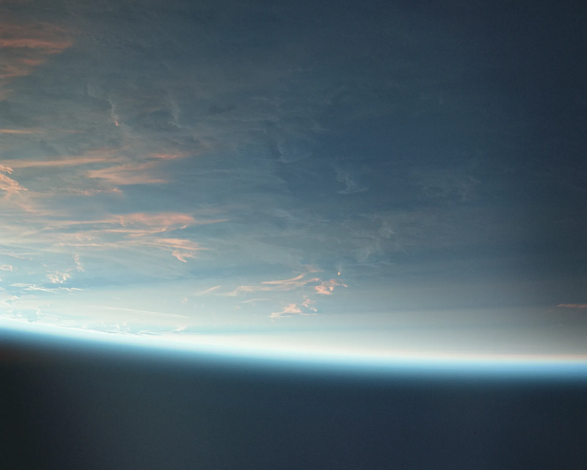 Curved horizon of Earth seen from space at sunrise, symbolizing the spirit of exploration in the BESV MY26 campaign